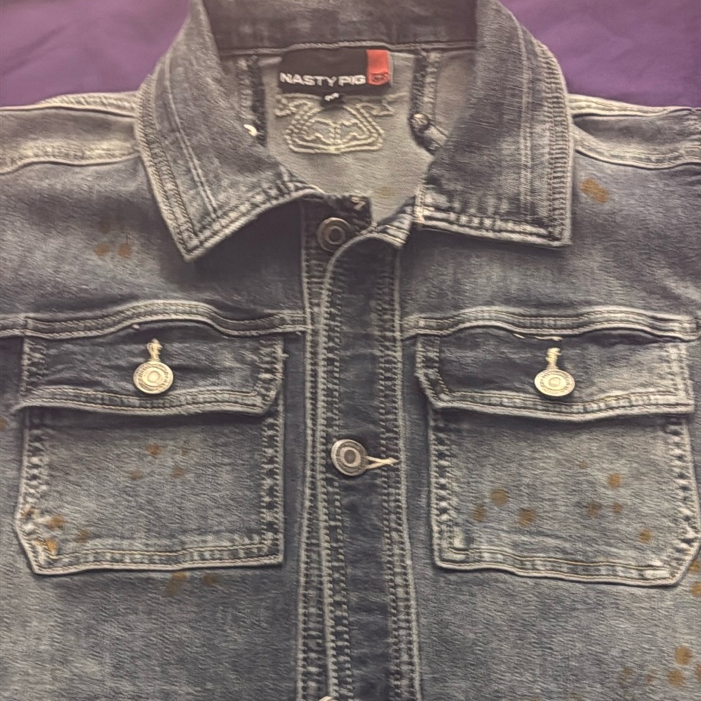 NWOT Nasty Pig stretch sleeveless jean jacket. Medium